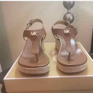 Like new Michael Kors Women's Tan Wedge Sandals size 9.5 women